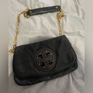 Tory Burch black clutch with gold strap